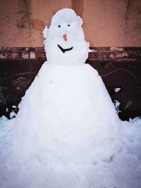 White toy on snow during winter