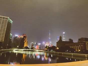 Illuminated buildings in city at night