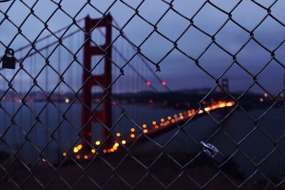 Sea seen through chainlink fence