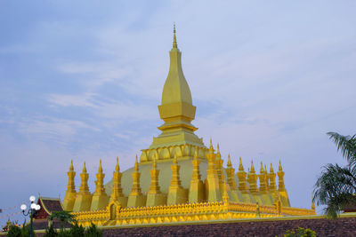 Low angle view of temple against building