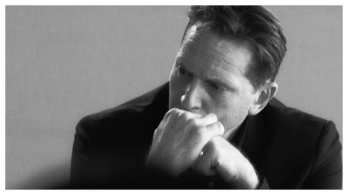 Young man looking at camera