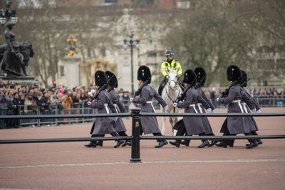 Changing the guard parade, london, uk. soldiers marching in front of buckingham palace