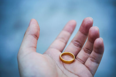 Close-up of person holding hands