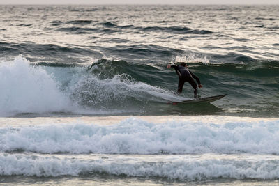 Man surfing in sea