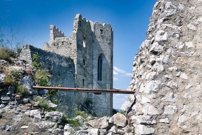 Old castle ruins against blue sky