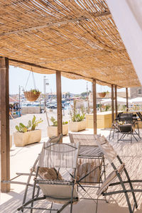 Empty chairs and tables in restaurant