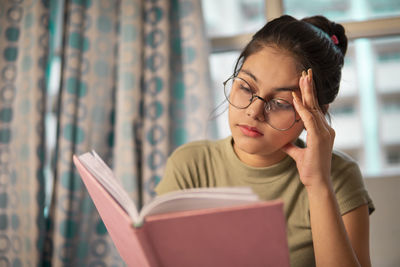 Young woman using laptop