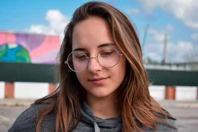 Close-up portrait of a smiling young woman