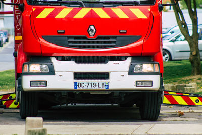 Close-up of vintage car on road