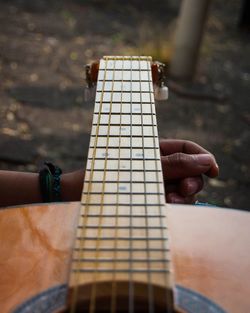 Person playing guitar