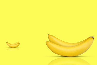 Close-up of yellow slices over white background