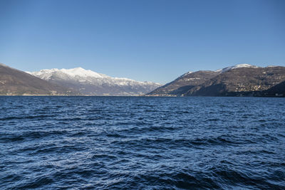 Lake maggiore with the snow-capped mountains in the background