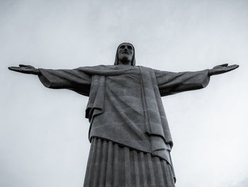 Low angle view of christ the redeemer against sky