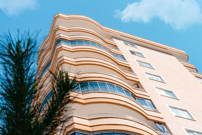 Fragment of a modern residential exterior of an apartment building.