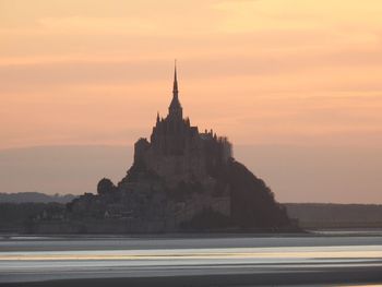 Building against sky during sunset le mont saint michel