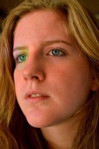 Close-up of thoughtful teenage girl looking away