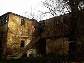 Abandoned building against sky