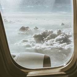 Cloudscape seen through airplane window