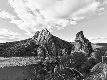 Scenic view of rocky mountains against sky