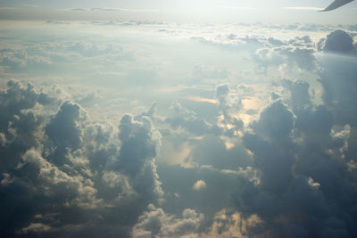 Aerial view of sunlight streaming through clouds