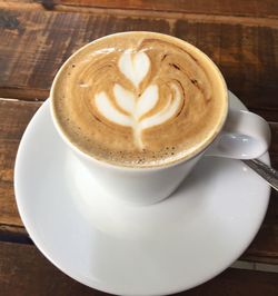 Close-up of cappuccino on table