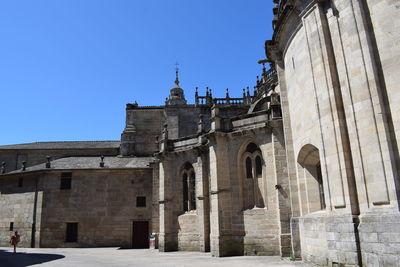 Low angle view of historical building against clear sky