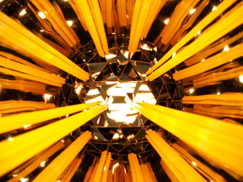 Low angle view of illuminated lights at night