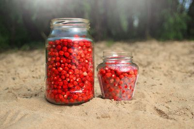 Close-up of berries in jars