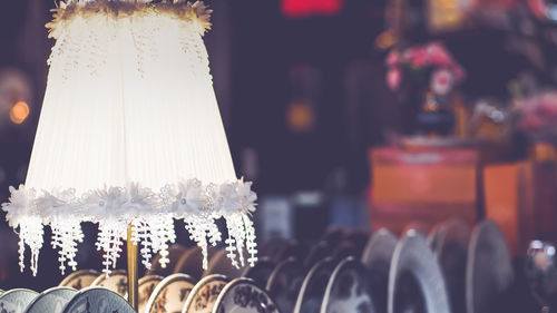 Close-up of illuminated electric lamp