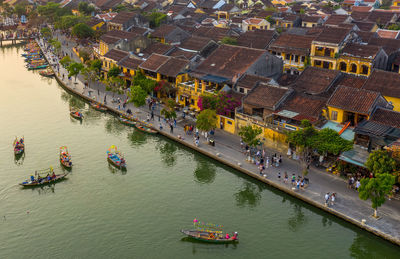 High angle view of people on boats in canal