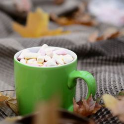 Close-up of coffee cup on table