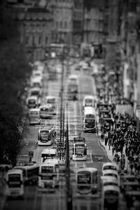 Tilt-shift image of cars on road in city