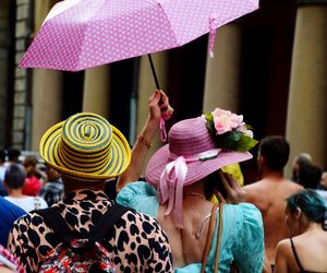 Rear view of people with multi colored umbrellas