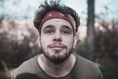 Portrait of young man wearing hat