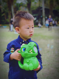 Portrait of cute boy with stuffed toy