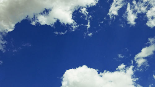 Low angle view of clouds in blue sky