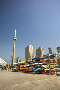 Buildings in city against clear sky