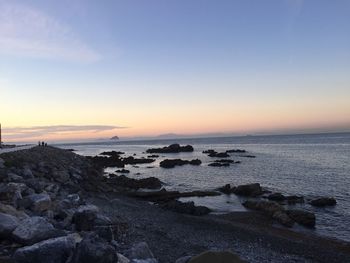 Scenic view of sea at sunset