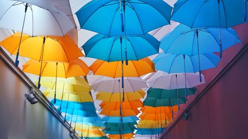 Low angle view of multi colored umbrellas