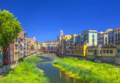 Colorful houses at river onyar in girona, catalonia spain