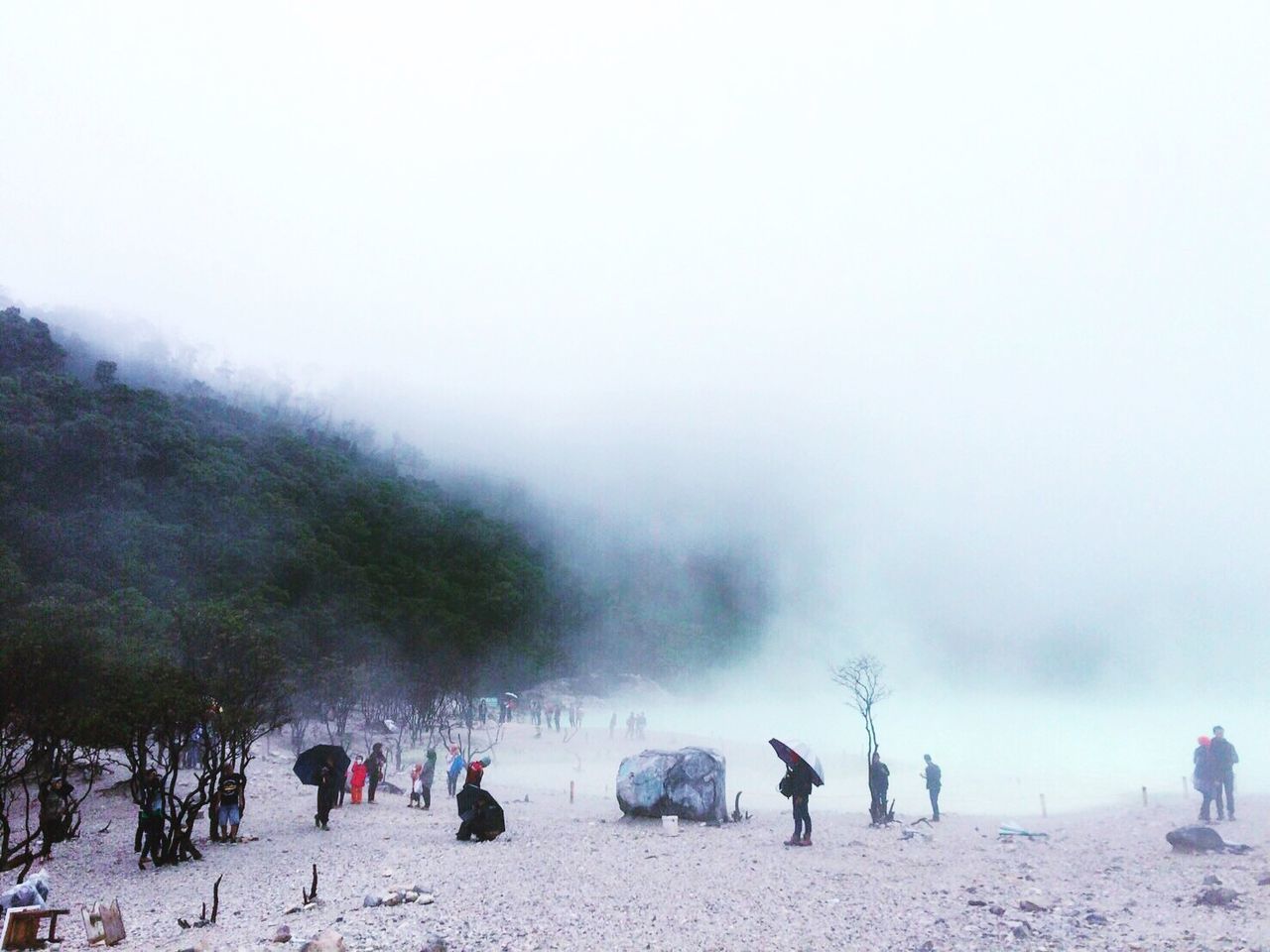 weather, lifestyles, fog, leisure activity, sky, season, scenics, nature, beauty in nature, vacations, landscape, tranquility, tranquil scene, mixed age range, tourism, foggy, day, overcast, non-urban scene, tourist, outdoors, travel destinations, mountain, idyllic, cloud - sky