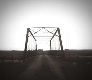 View of suspension bridge against clear sky