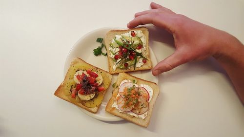 Close-up of hand holding fruit