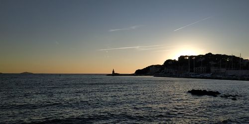 Scenic view of sea against sky during sunset