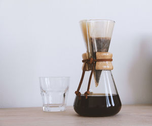 Close-up of coffee in glass on table