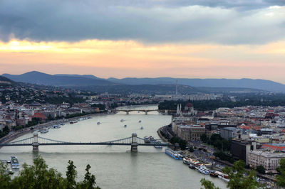 High angle view of town against cloudy sky