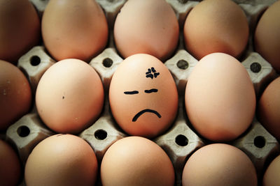 Full frame shot of eggs in carton