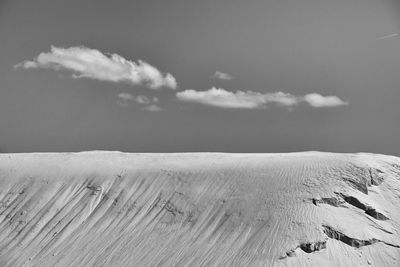 Scenic view of snow covered landscape against sky