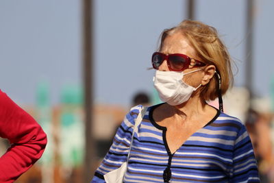 Portrait of woman wearing sunglasses