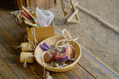 High angle view of wicker basket on table